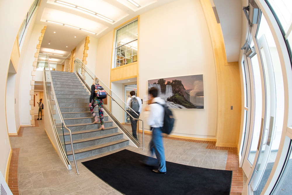 Bright interior of Suffield Academy hallway using fish eye lens