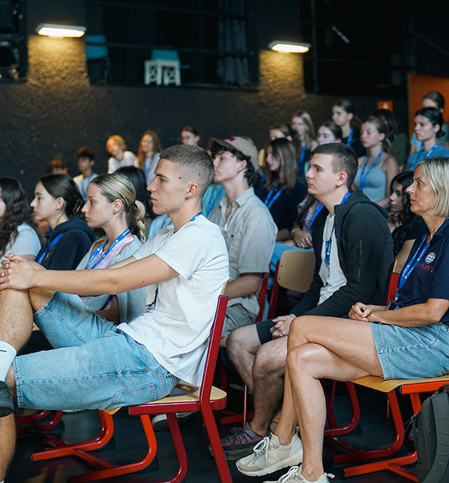 students at a school assembly