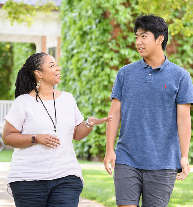 female private school teacher and male student