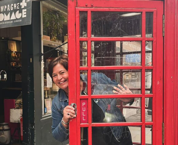 Kristen Mariotti in a London phone booth